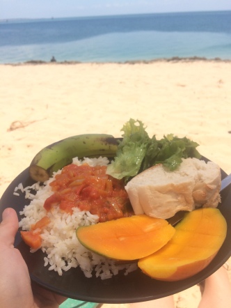 Christmas lunch - rice with tomato sauce, bread, and all the fruit I could've wanted